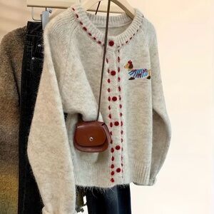 Cozy Cream Button-Front Wool Blend Sweater with Red Trim